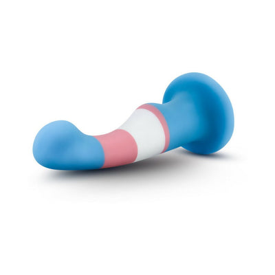 Curved silicone dong in blue, pink, and white with a suction cup base, inspired by the transgender pride flag.