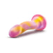 Pink and yellow swirled curved dildo with suction cup base on white background