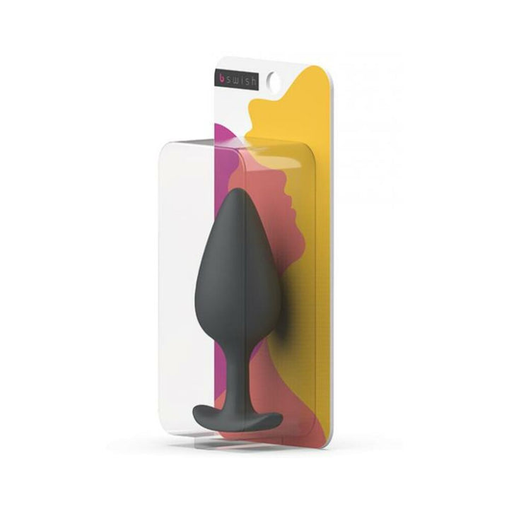 B Swish Bfilled Basic Plus anal plug in slate gray with smooth silicone surface in clear retail packaging.