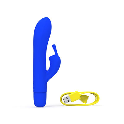 Blue Bwild Infinite Classic Bunny vibrator with yellow USB charging cable on white background.