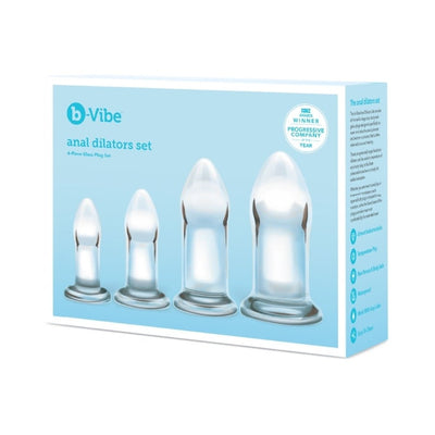 b-Vibe 4-piece set of clear glass anal dilators in graduated sizes with rounded tips and flared bases in blue packaging