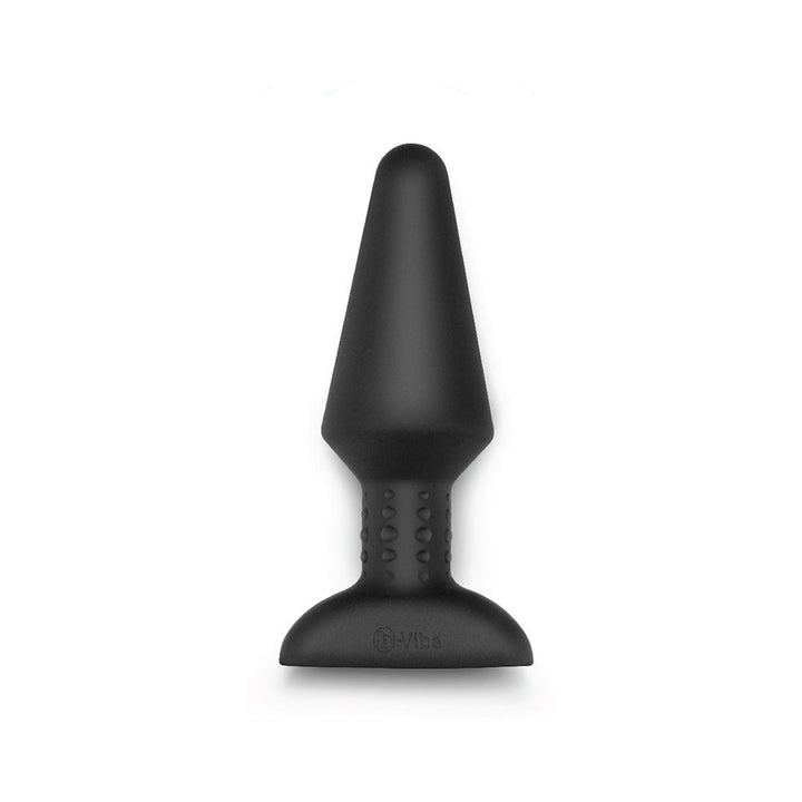 Black silicone B-Vibe Rimming Plug XL with tapered tip and textured neck on a wide base.