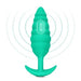 Large green textured silicone plug with tapered tip and ergonomic base, designed for vibrating sensory stimulation.