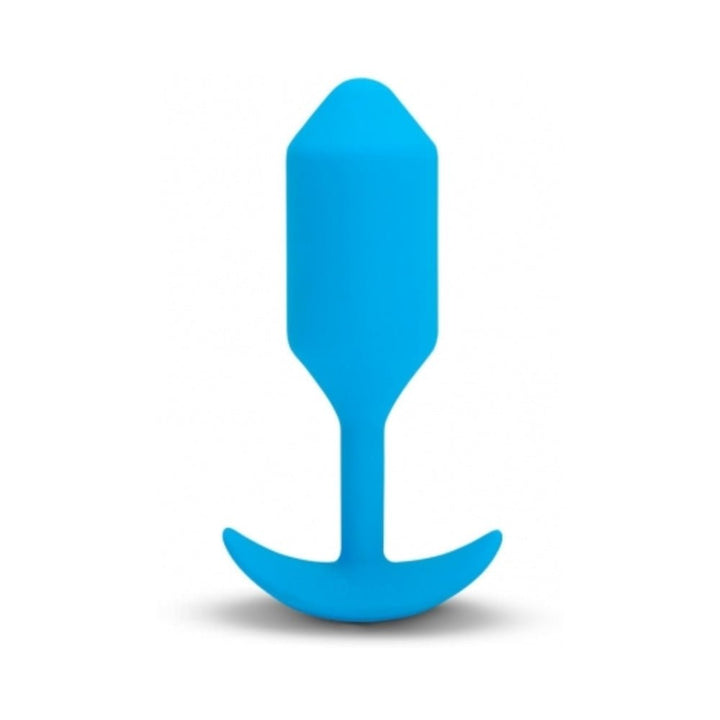 Blue silicone b-Vibe Vibrating Snug Plug 3 with tapered tip and curved base for comfortable fit and secure placement.