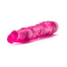 Pink translucent realistic textured vibrator with tapered head and twist dial base on white background