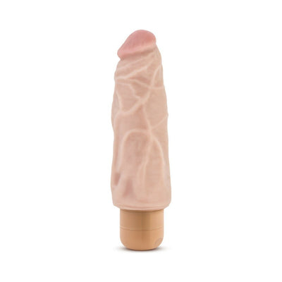 Beige realistic vibrator with textured shaft and twist dial base for adjustable multispeed vibrations.