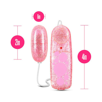 Pink glitter mini bullet vibrator with wired remote control, measuring 2 inches by 1 inch and 4 inches in length.