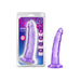 Purple translucent curved dildo with suction cup base next to its retail packaging showing product features.