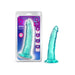 Teal translucent curved dildo with suction cup base displayed next to its branded packaging.