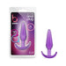 Purple slim tapered anal plug with contoured base displayed next to its packaging labeled body-safe and phthalate-free.