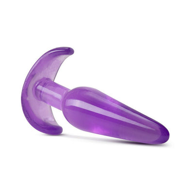 Purple slim tapered anal plug with ergonomic base, made from smooth, flexible body-safe material.