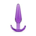 Purple slim tapered anal plug with ergonomic curved base, made from smooth translucent material.