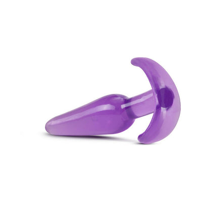 Purple slim tapered anal plug with ergonomic curved base, designed for comfort and beginner-friendly use.