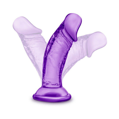 Purple 4-inch flexible dildo with suction cup base shown bending to demonstrate flexibility.