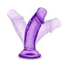 Purple 4-inch flexible dildo with suction cup base shown bending to demonstrate flexibility.
