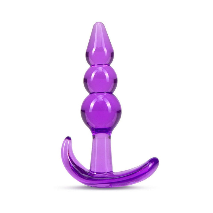 Purple triple bead anal plug with curved base for comfort and secure fit, made from smooth, body-safe material.