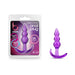Purple triple bead anal plug with tapered tip and contoured base shown in packaging and separately.