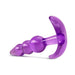 Purple triple bead anal plug with a curved base, made from smooth, translucent material for comfort and stimulation.