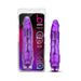 Purple realistic textured vibrator with twist dial base shown in and out of clear retail packaging.