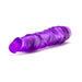 Purple translucent realistic vibrator with textured shaft and twist dial base on white background