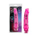 Purple translucent flexible vibrator with realistic design and twist dial base, shown with packaging.