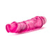 Pink translucent flexible vibrator with textured shaft and twist dial base on white background