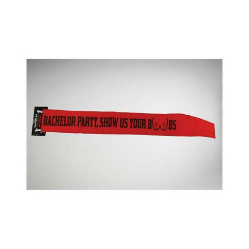 Red bachelor party sash with black text reading "Bachelor Party, Show Us Your Boobs" and a playful graphic design.