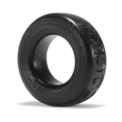 Small black silicone ballstretcher ring with textured surface and embossed branding.