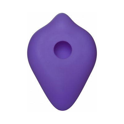 Purple silicone BumpHer sleeve with a central hole and contoured shape for strap-on enhancement.