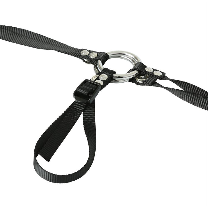 Black adjustable strap-on harness with metal o-ring and buckle detail on white background.