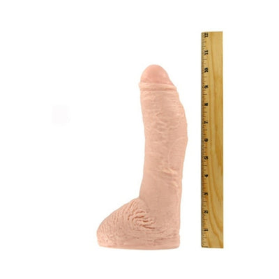 Realistic flesh-toned adult toy with textured base standing next to a wooden ruler showing 10-inch length.