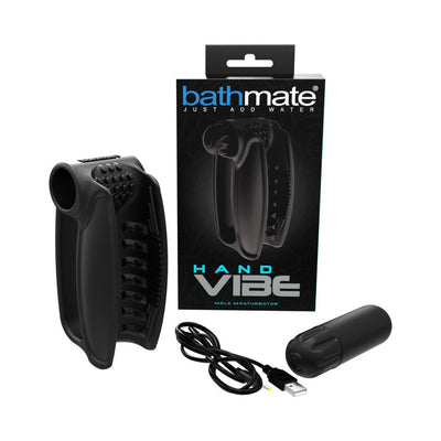 Bathmate Hand Vibe male masturbator with textured silicone sleeve, USB charging cable, and vibrating bullet next to product box.