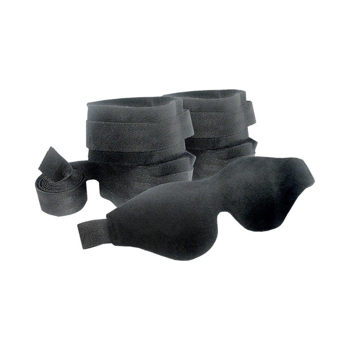 Black beginner bondage kit with four adjustable wrist and ankle restraints and a soft black blindfold.