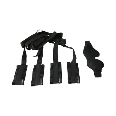 Black beginner bondage kit with four adjustable wrist and ankle restraints and a soft black blindfold on white background.