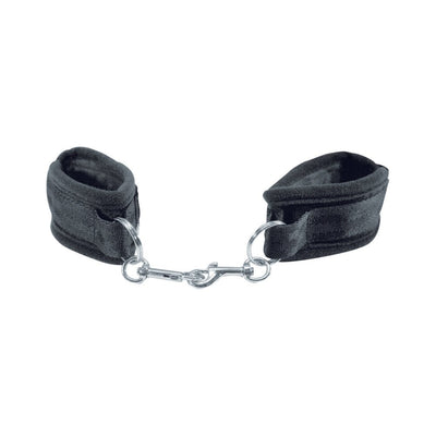 Black beginner's handcuffs with soft Velboa lining and metal snap link connectors for comfortable restraint play.