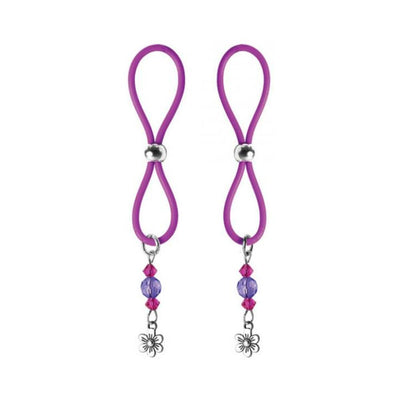 Pair of purple silicone nipple halos with adjustable silver bead and flower charm dangles with purple and pink beads.