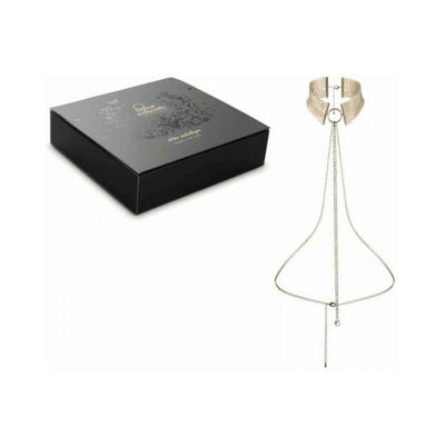 Gold metallic adjustable collar with delicate chain design and black elegant packaging box.