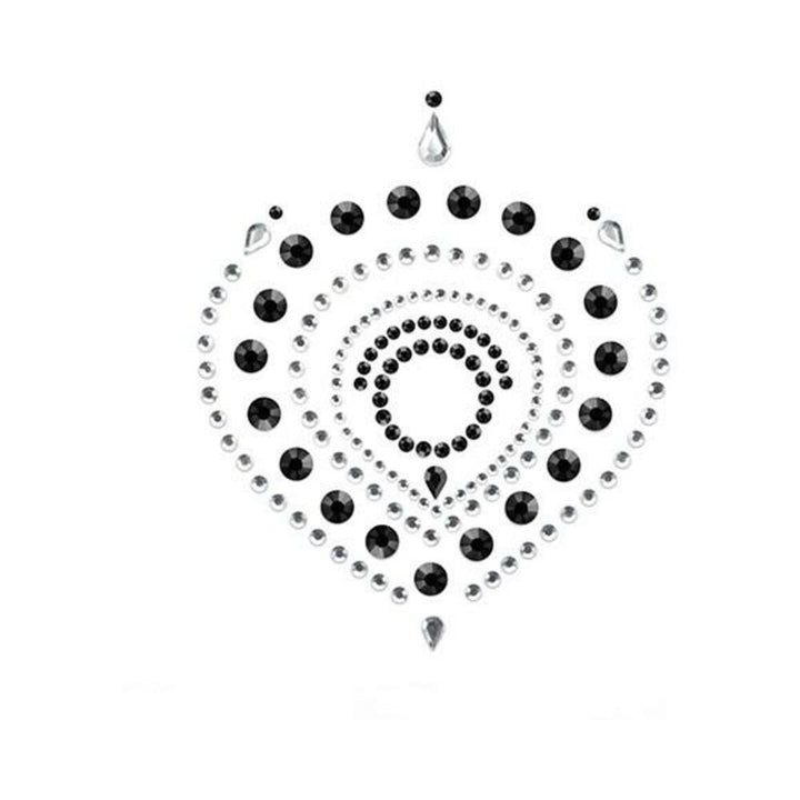 Black and silver crystal body tattoo with circular and teardrop shapes in an intricate pattern
