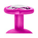 Close-up of pink silicone plug base with white gem heart-shaped accent from Luxe 3-piece bling plug training kit