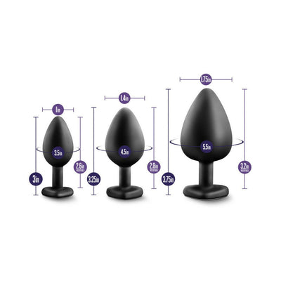 Three black tapered plug trainers in small, medium, and large sizes with heart-shaped bases and measurement details.