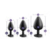 Three black tapered plug trainers in small, medium, and large sizes with heart-shaped bases and measurement details.