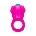 Bright pink flexible ring with a large faceted gem-shaped top and a small blue button for vibration control.