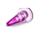 Translucent purple tapered anal plug with a wide base for secure and comfortable use.