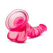 Translucent pink realistic dildo with suction cup base and detailed texture, curved for targeted stimulation.