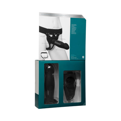 Packaging of Body Ext Hollow Bulbed Strap-On 2pc Set showing black silicone attachment and adjustable harness in teal and white box.