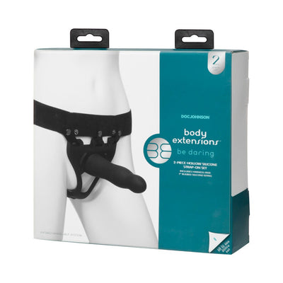 Packaging of Doc Johnson Body Extensions Be Daring hollow slim dong strap-on set in black with adjustable harness.