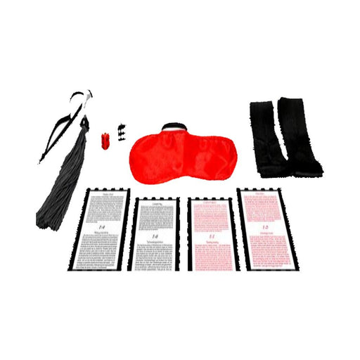 Bondage Seductions kit with red blindfold, black silk ties, rubber whip, dice, and instruction cards on white background.