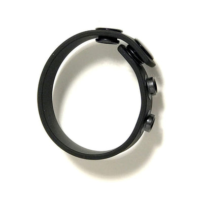 Black adjustable silicone strap with snap buttons for customizable fit, designed for comfort and durability.