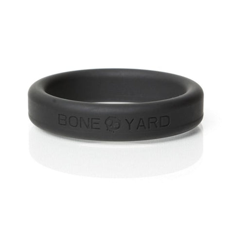 Black Boneyard silicone ring with embossed logo, smooth finish, and rounded edges, size 45mm.