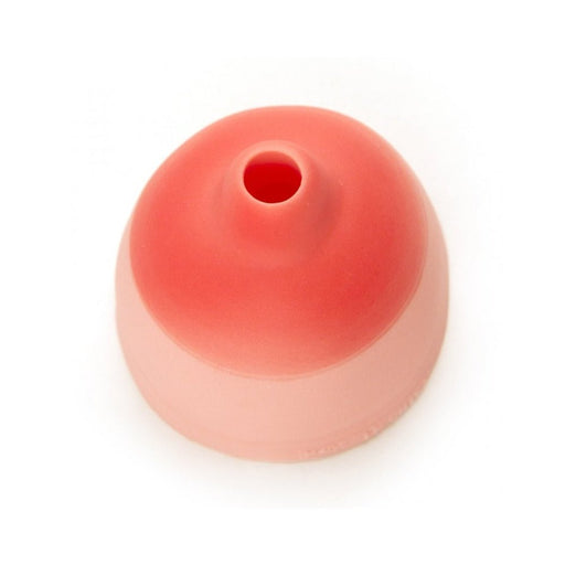 Pink silicone beer can topper with a small drinking hole, designed for easy attachment to beverage cans.